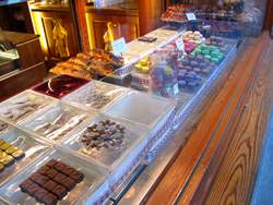 �}�J����